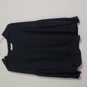 Orange Farm U.S.A black blouse